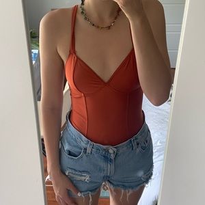 urban burnt orange bodysuit